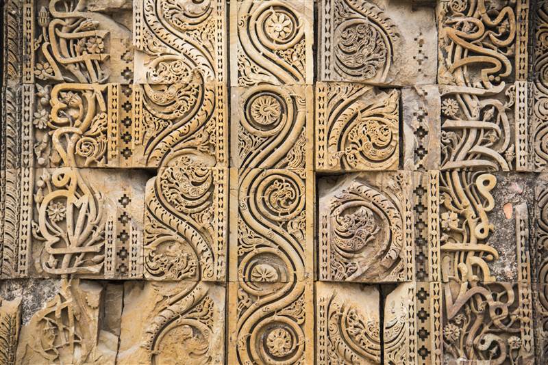 Qutub Minar stone carving detail in New Delhi